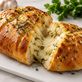 Stuffed garlic bread with cheesy filling